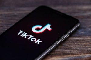 TikTok: Two Fingers on Arm Meaning